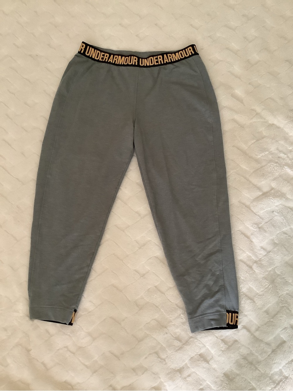 Under Armour Steel Gray Joggers with Black & Gold Branded Waistband